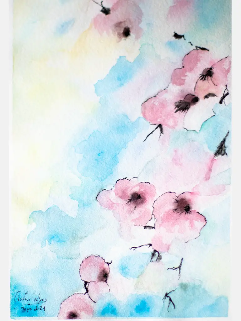 Pintura a color con acuarelas de flores rosas en fondo azul.